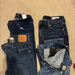 4 pairs of jeans. $14 for all. All in great condition, 4 styles. 4 Brands